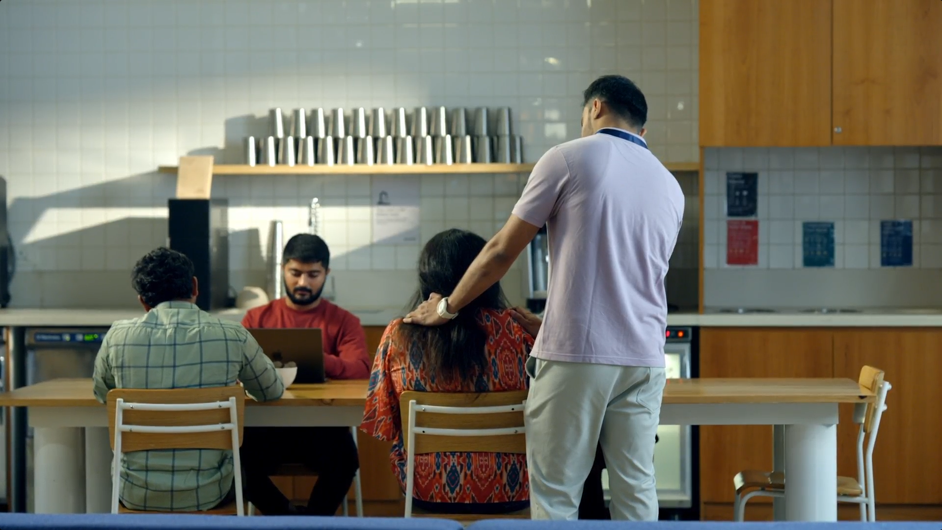 Workplace scene demonstrating professional boundaries and consent in POSH training